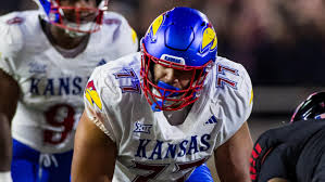 49ers select Kansas T Enrique Cruz Jr. with the 179th-overall pick in the 2026 NFL Draft